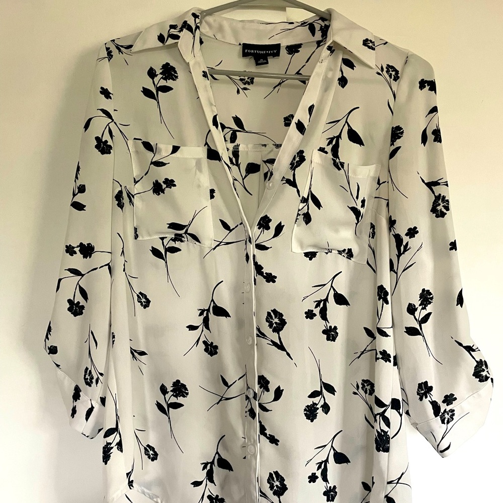 White and black floral blouse
